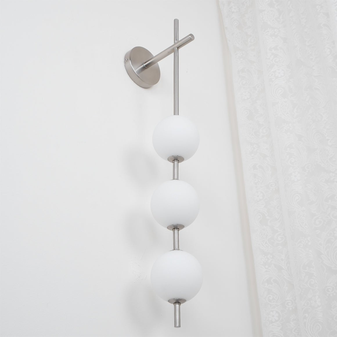 Cerin Vertical Globe Wall Lamp