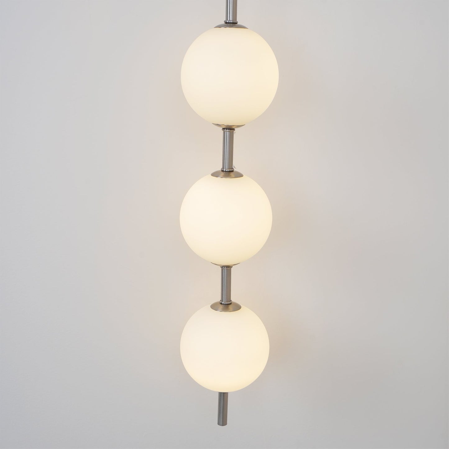 Cerin Vertical Globe Wall Lamp